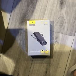 The item is a PowerLimp portable power bank with a built-in AC plug€