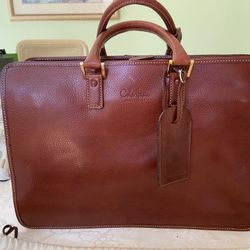 Briefcase Authentic Cole Haan brand new all leather burgundy briefcase original price $750.00