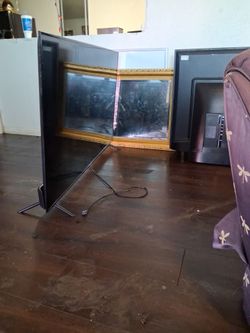Large Flat Screen TV with Stand
