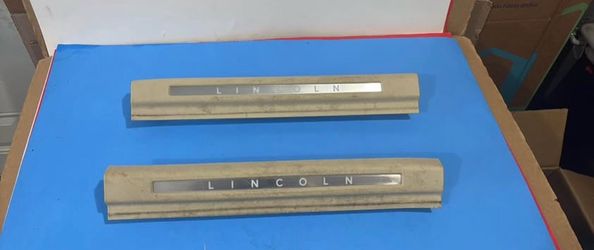 13-16 LINCOLN MKS LEFT AND RIGHT DOOR STEP SCUFF PLATE TRIM USED OEM