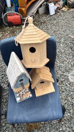 3 wooden bird houses