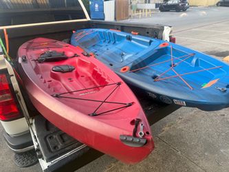 One fishing kayak and one regular kayak