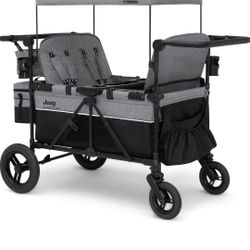 Jeep Wrangler Deluxe 4 Seater Stroller Wagon by Delta Children - Premium Quad Stroller Wagon for 4 Kids with Convertible Seats, Adjustable Push/Pull H