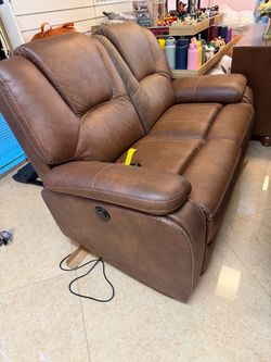 Brand new open box love seat with power recliner