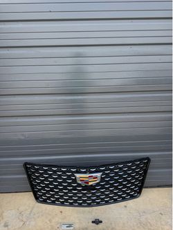 CADILLAC ESCALADE ORIGINAL FRONT GRILLE BLACK WITH CAMERA HOLE 2025/2026