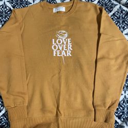 Seek Discomfort Orange Love Over Fear Sweatshirt  XS