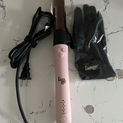 Brand New Rotating Curler 