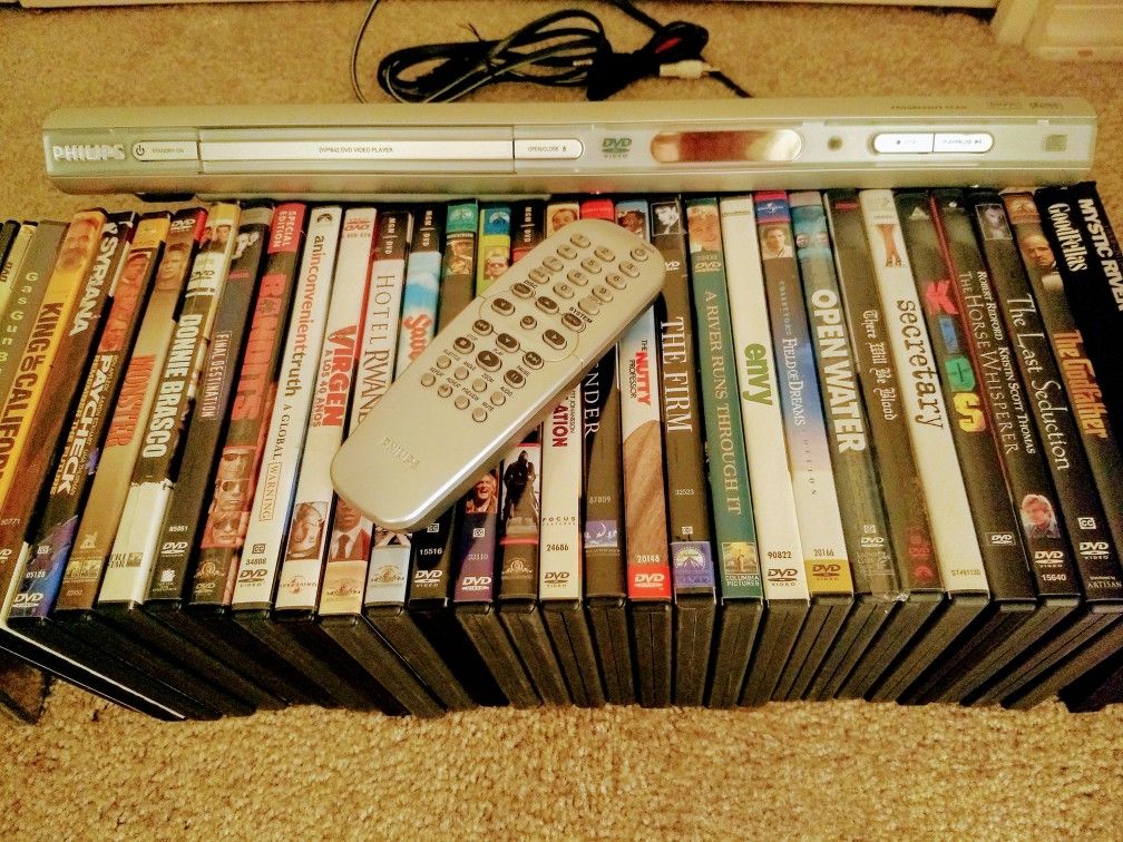 PPU! 34 DVDs /w a Philips DVD player