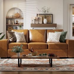 2 Tan Leather Sofas