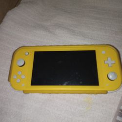 Yellow Nintendo switch with Mario case and games