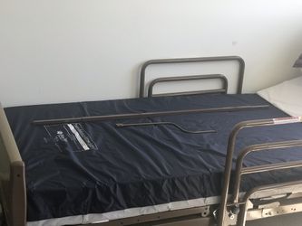 FREE: Electronic Hospital Bed 🛏 Pictured: NO MATTRESS, Black Bed Rails. $0. ESTATE SALE