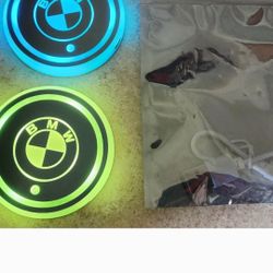 BMW, Lexus, Cadillac Or Mercedes Led Color Changing USB charged Car Cupholder Coasters.  Colors slowly fade from one color to the next. 