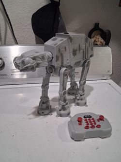 Thinkway toys Star wars U- Command AT-AT  walker with a remote control.  Good working condition.