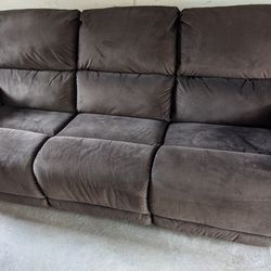 Brown couch and recliner