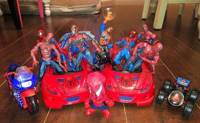 10 Spidermen , 2 cars and a motorcycle