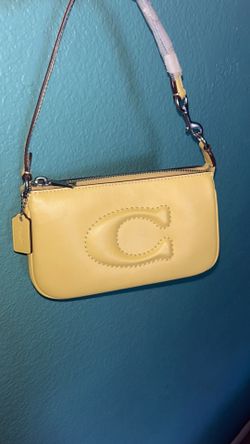 Yellow coach handbag