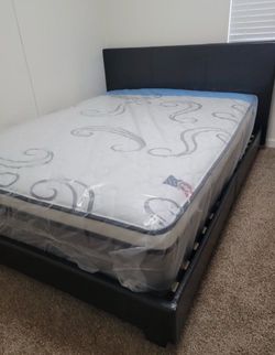 Brand new queen size bed frame with a mattress