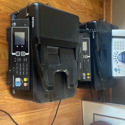 Two Epson Printers And A Fax Machine 