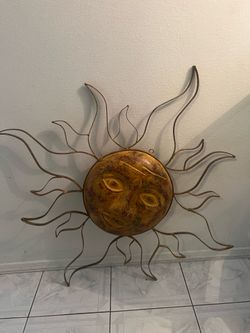 Celestial sun face