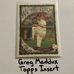 Greg Maddux Atlanta Braves Hall of Fame Pitcher Topps Short Print Insert Card. 