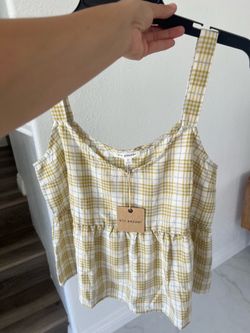 New women top size S (fits medium)
