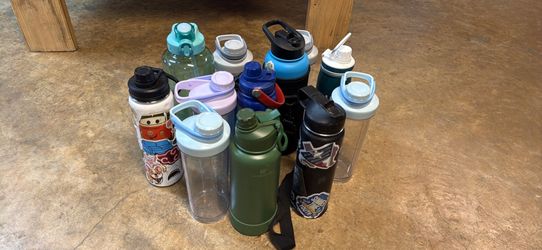 Assortment of used water bottles