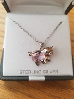 Pink sapphire and sterling silver pig pendant and chain