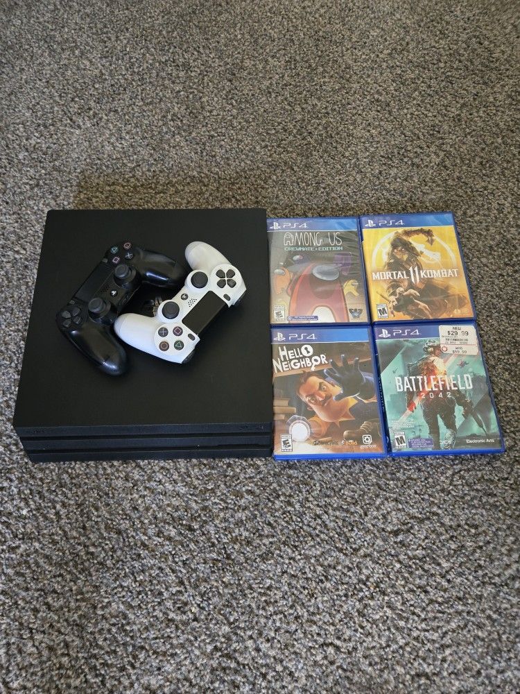 Playstation 4 Pro, 2 Main Cables, 2 Controller, 4 Disc's