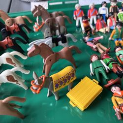 Assortment Of Playmobil Figures And Accessories 