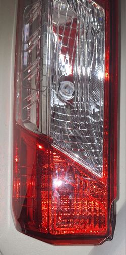 New Ford Transit L. Tail Light (Drivers side). has small chip near bottom see pics. N.Phx
