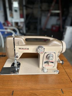 Vintage Sewing Machine In Foldable Table