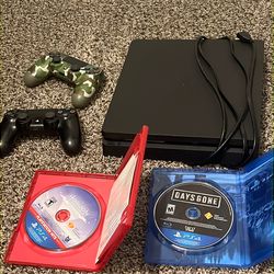 Ps4 slim with two controllers and 4 games 2 fisic  games and 2 digital games ( if you buy it you get gta and fifa too)