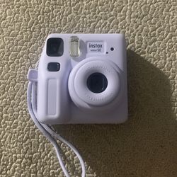purple  polaroid camera