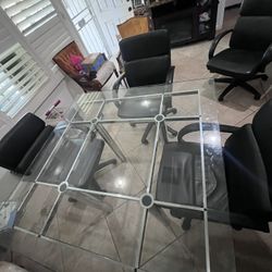 54x54 Dining Glass Table With Four Leather Rolling Chairs
