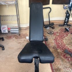 Weight Bench With 50 Lbs Of Weights. Adjustable