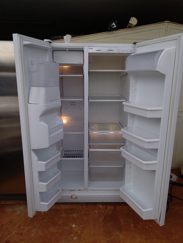 Excellent condition Kenmore side by side refrigerator ice maker cold