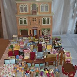 2008 vintage fisher price doll house.