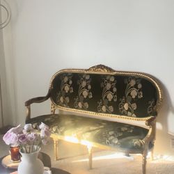 dark green and gold couch 