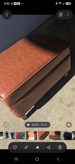 Crackled  brown leader ottoman