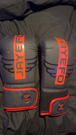 Red and black Jayefo boxing gloves