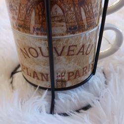 Porcelain Exclusively For Pier 1 Imports
Stacking Mugs of Paris/Eiffel Tower, set of 4. 8 oz coffee/tea mugs 