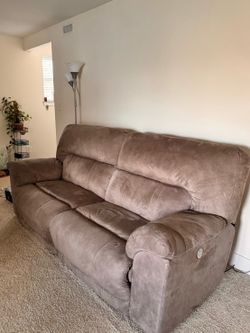 Two seater power reclining sofa - Used