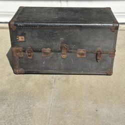 Vintage Wheary Steamer Trunk