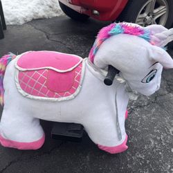 Ride-on plush unicorn