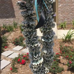 Money ,ribbon And Floral Lei's