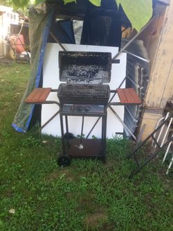 Char Broil: 2 Burner Gas Grill In Good Working Condition.