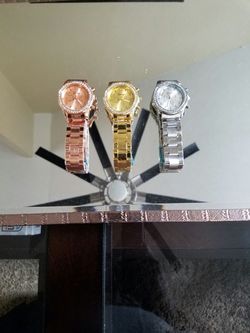 3 brand new watches. 20 bucks or best offer. My wife doesn't like them. My loss your gain. Im negotiable please come take them lol