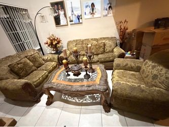 Living room set with center table, coffee table, console table and mirror.
