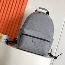 Louis Vuitton Gray Embossed Backpack – Designer LV Bag