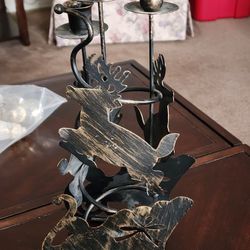 Metal reindeer sleigh with 3 tapered candle holders 14.5: tall x 6" wide. Wrought Iron distressed.
